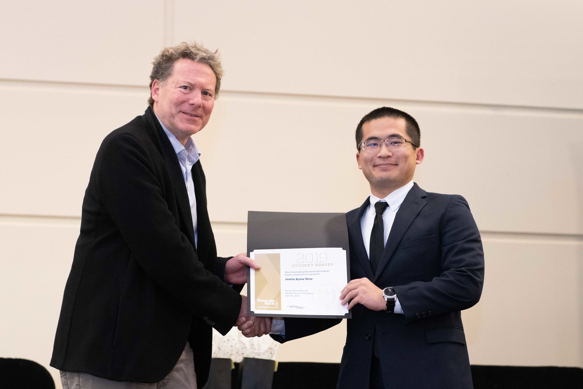 Justin Kyaw Htay (right) with College of Engineering Associate Dean Laurence Jacobs