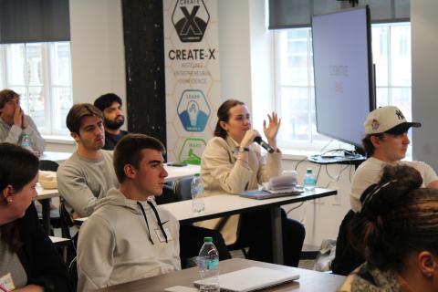 CREATE-X Spring Startup Launch participant asks question to alumni founders presenting at kickjoff during the Spring program.”